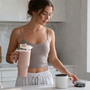 Adult using an insulated bottle for coffee in the morning and water later in the day