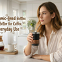 Adult using a ceramic-lined bottle or tumbler for coffee during a calm workday morning